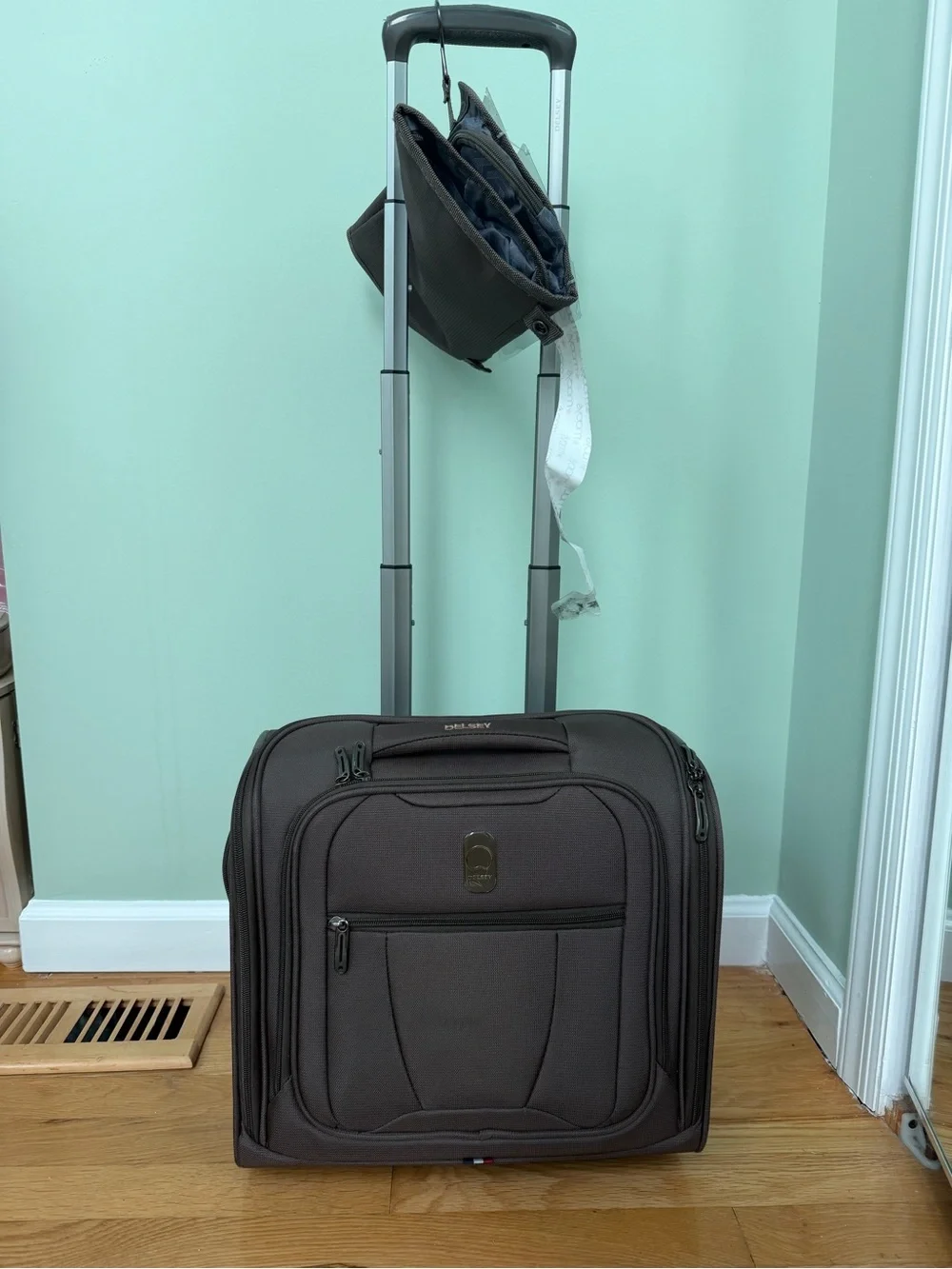 Brown Rolling Carry-On under seat luggage